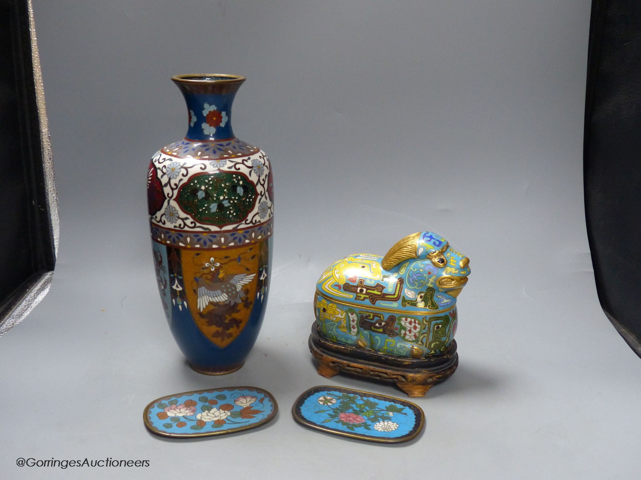A Japanese cloisonne enamel vase, two similar dishes and a 20th century Chinese cloisonne enamel mythical beast box & cover